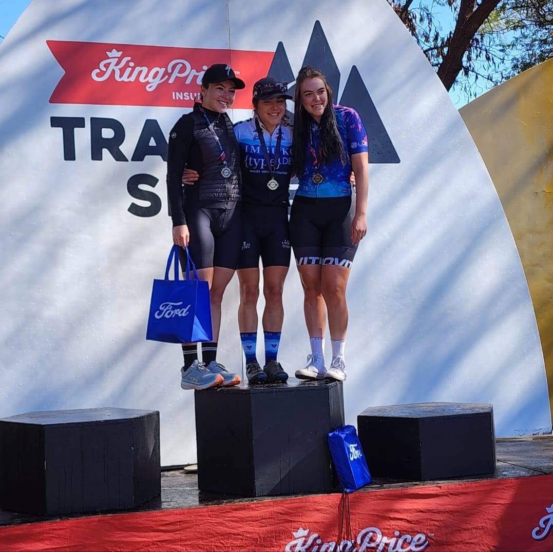 Jade Slabbert proudly receiving her medal on the podium at the King Price Trailseeker @70km race.