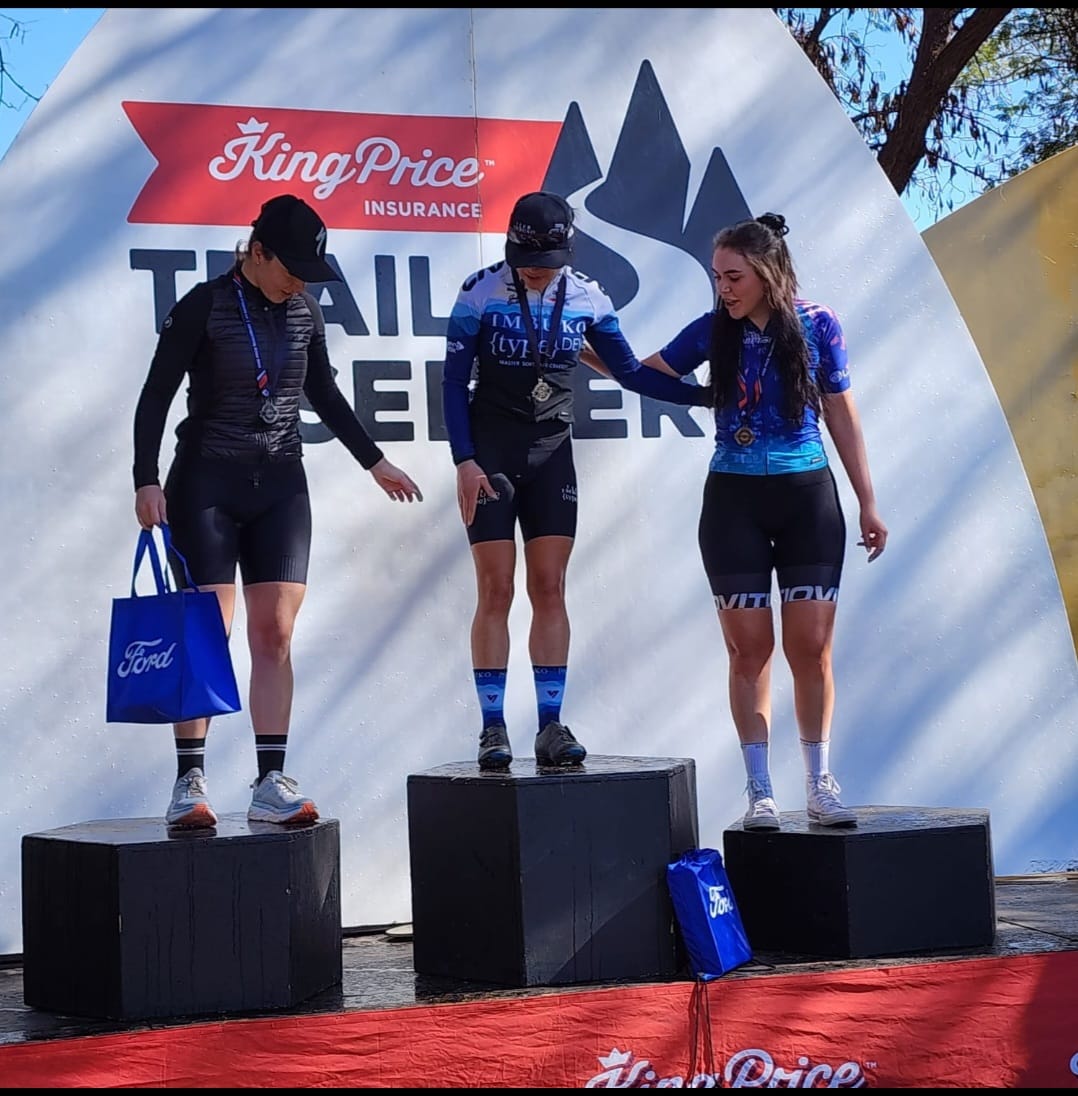 Jade Slabbert proudly receiving her podium medal at the King Price Trailseeker @70km race.