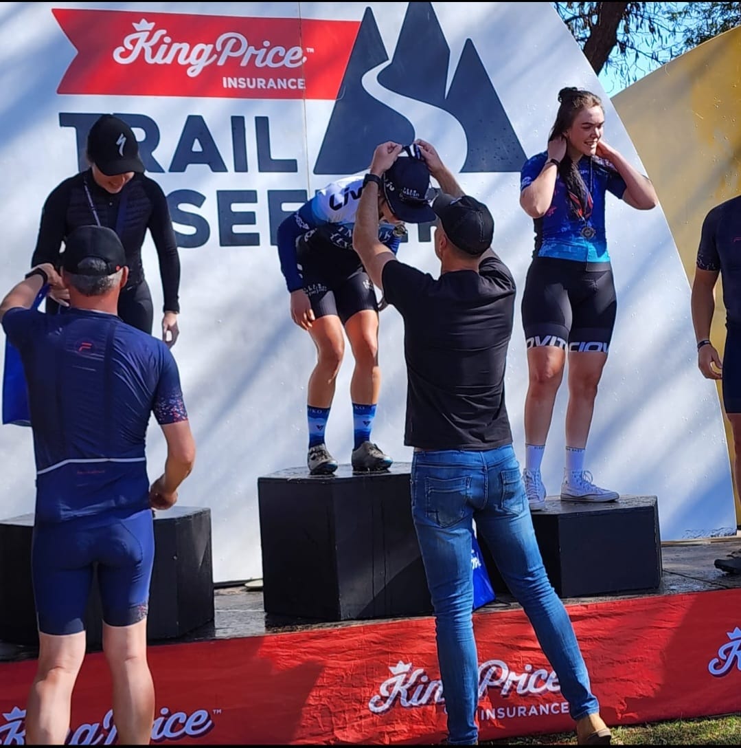 Jade Slabbert, sponsored athlete of Winspace South Africa, proudly receiving her medal on the podium.